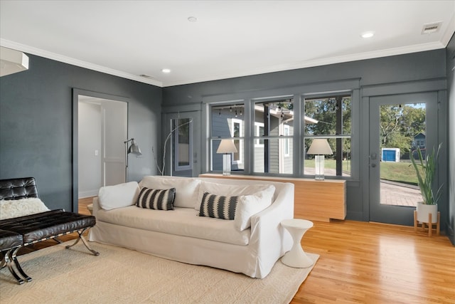 interior space featuring crown molding and hardwood / wood-style floors