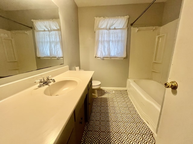 full bathroom featuring tile patterned flooring, vanity, toilet, and bathing tub / shower combination