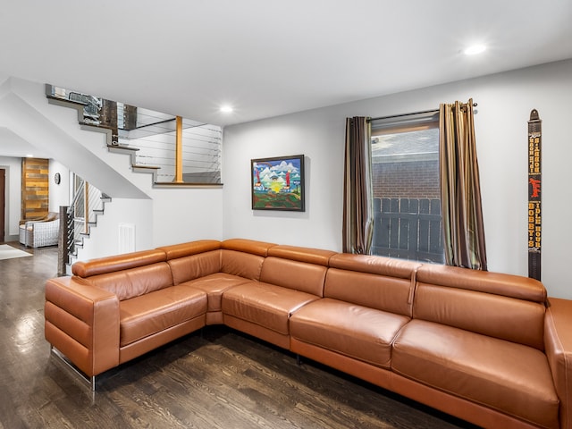 unfurnished living room with dark hardwood / wood-style flooring