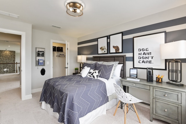 carpeted bedroom with a closet