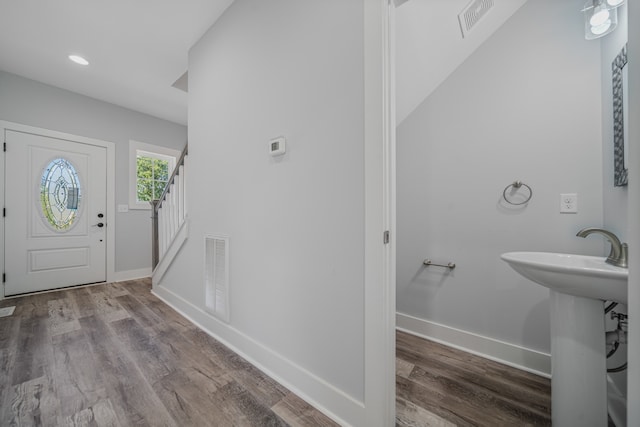 entrance foyer with hardwood / wood-style floors