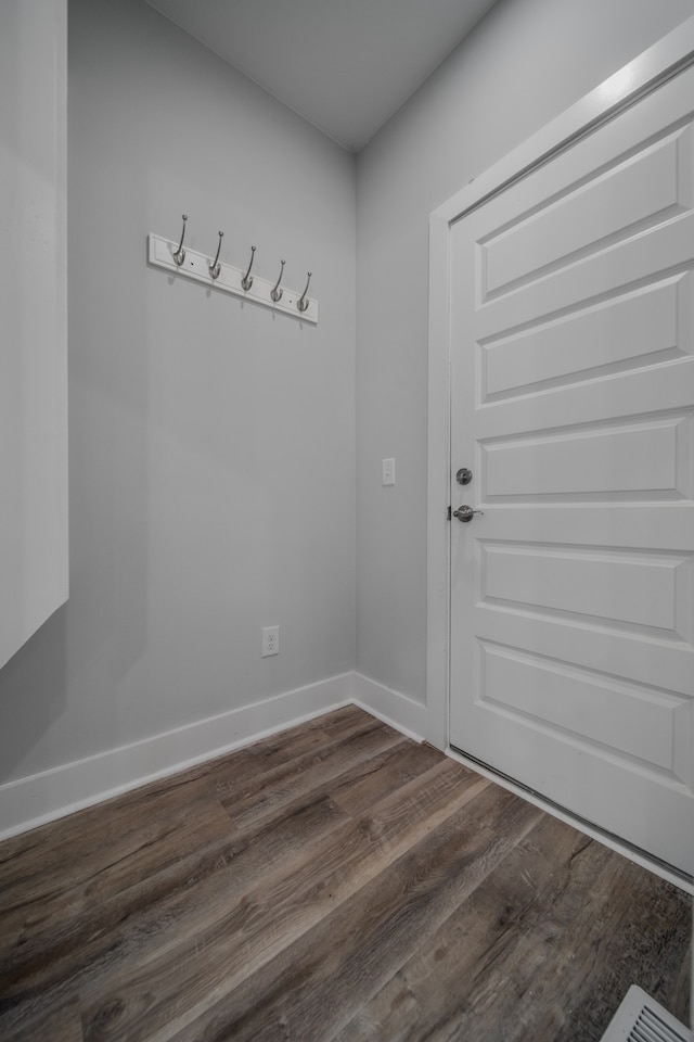 interior space with dark wood-type flooring