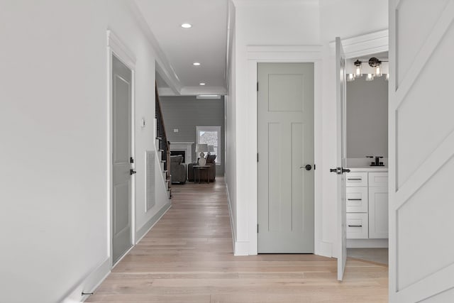 corridor featuring light hardwood / wood-style flooring