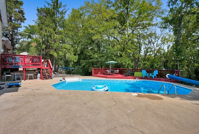 view of pool featuring a deck