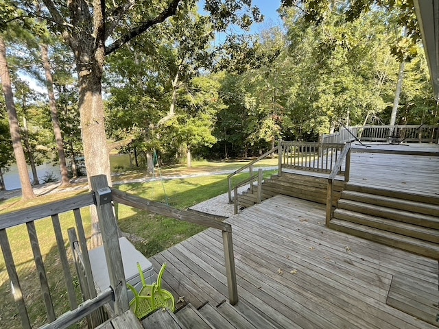 wooden deck with a yard