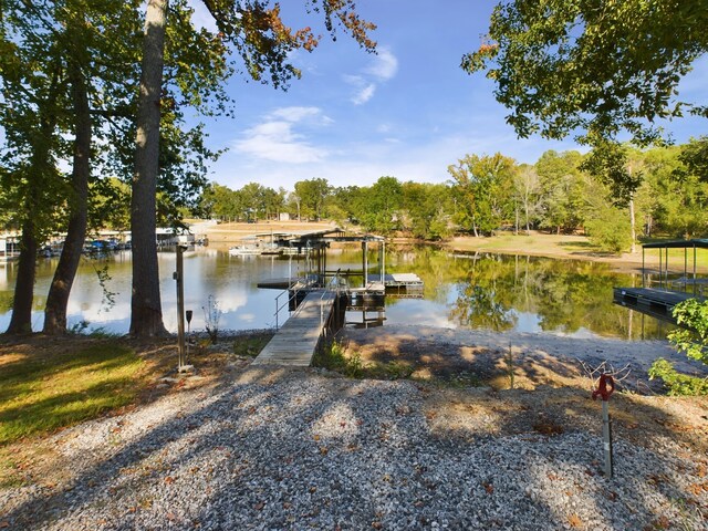 dock area featuring a water view