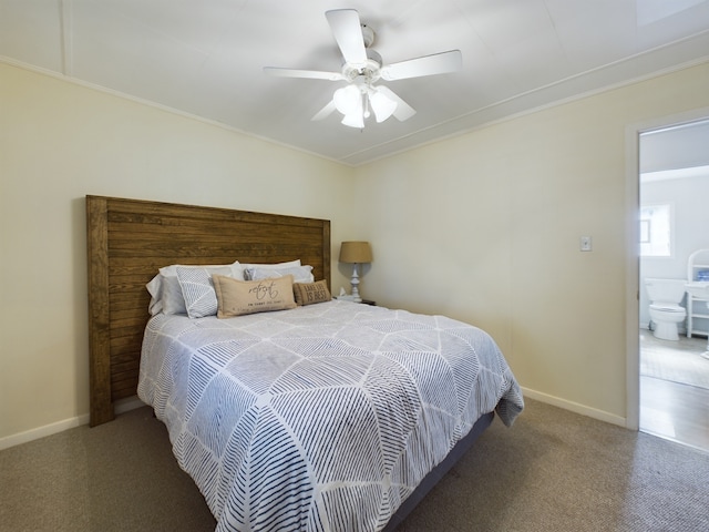 bedroom featuring ceiling fan, ornamental molding, ensuite bathroom, and carpet floors