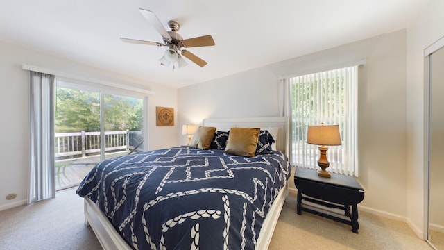 bedroom with ceiling fan, access to exterior, and light carpet