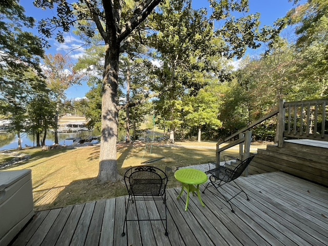 wooden terrace with a water view