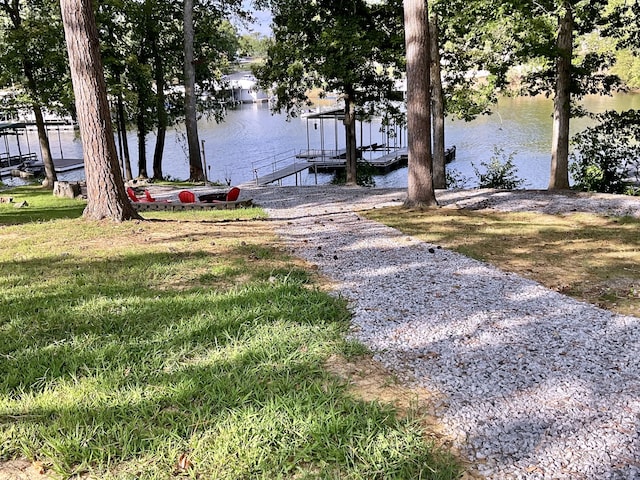 dock area with a water view