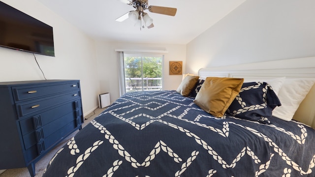 bedroom featuring access to outside and ceiling fan