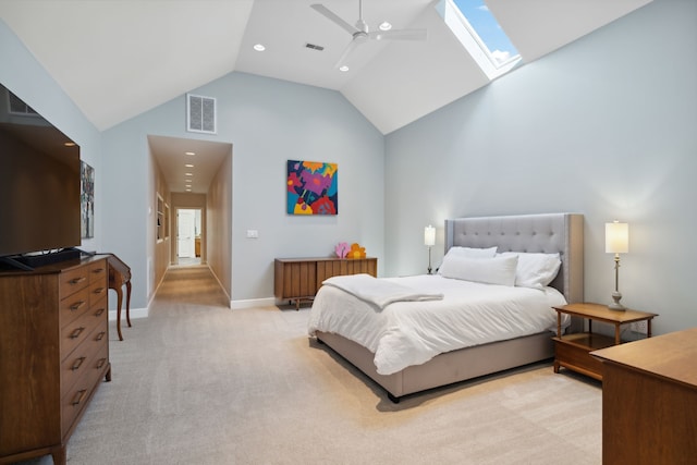 carpeted bedroom with ceiling fan and high vaulted ceiling