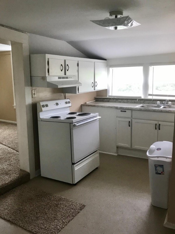 kitchen featuring white cabinetry, vaulted ceiling, sink, and white electric range