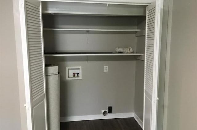 laundry room with hookup for a washing machine, electric dryer hookup, and dark hardwood / wood-style floors