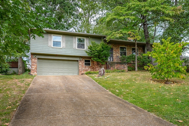 tri-level home featuring a garage and a front lawn