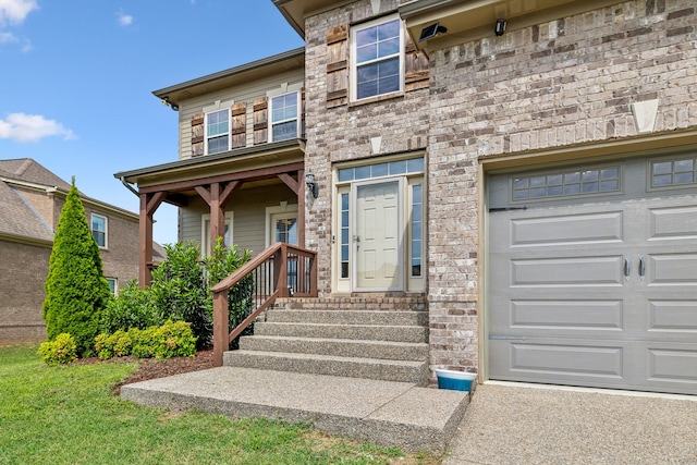 doorway to property featuring a garage