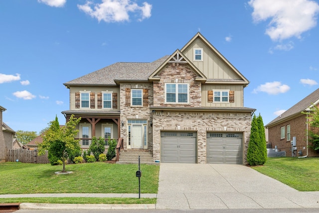 view of front of house with a front lawn and a garage