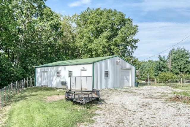 view of outdoor structure with a garage