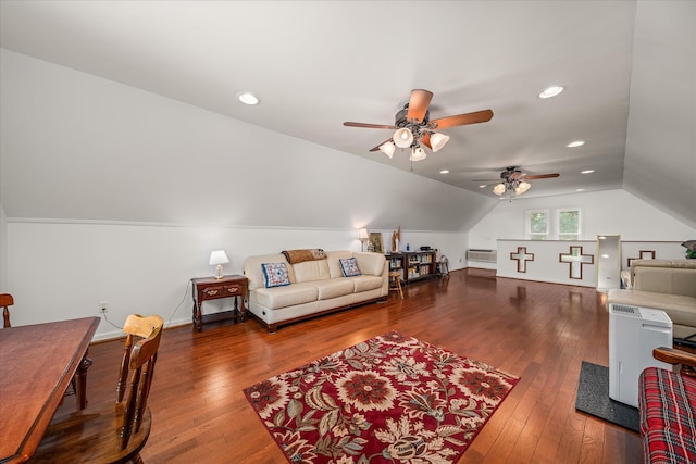 living room featuring lofted ceiling, hardwood / wood-style flooring, and ceiling fan