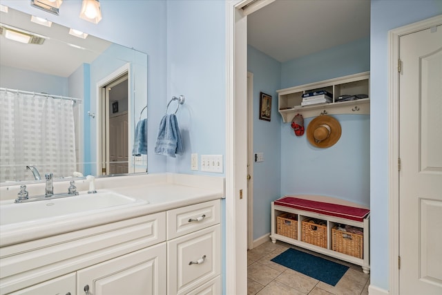 bathroom featuring vanity and tile patterned floors