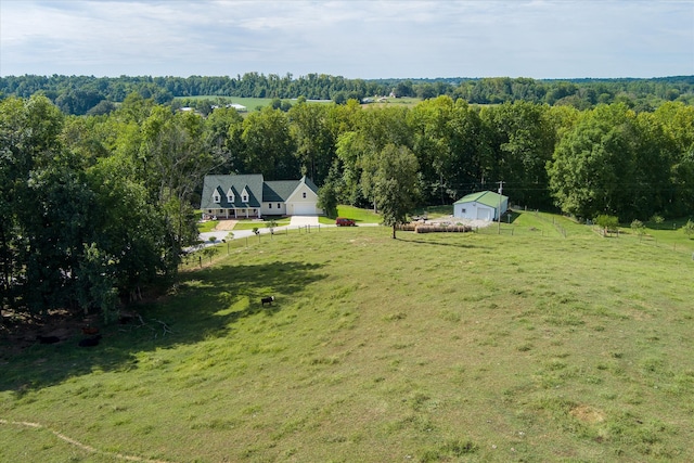 birds eye view of property featuring a rural view