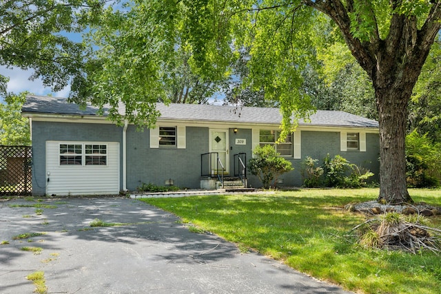 ranch-style house with a front yard