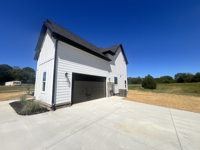 view of side of property featuring cooling unit