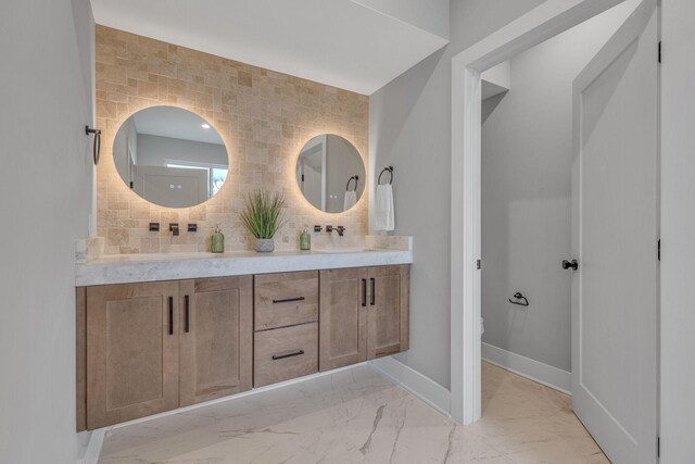 bathroom featuring vanity, toilet, and backsplash