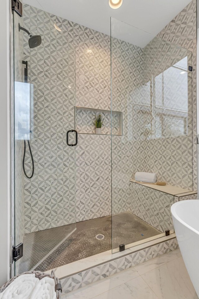 bathroom with independent shower and bath