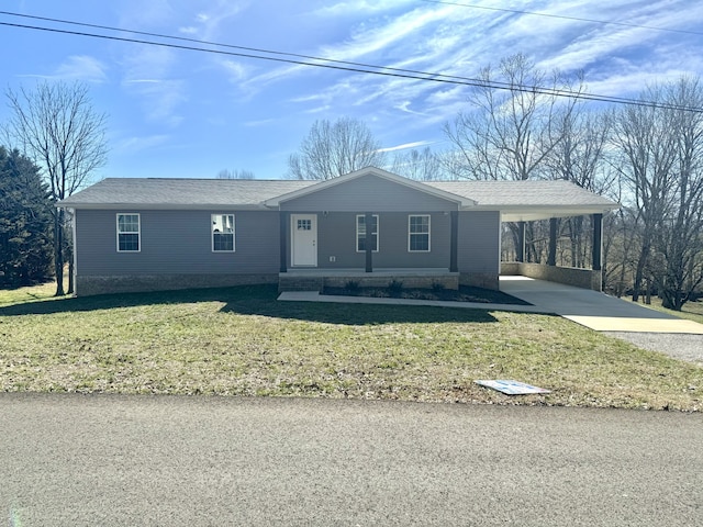 single story home with a carport and a front lawn