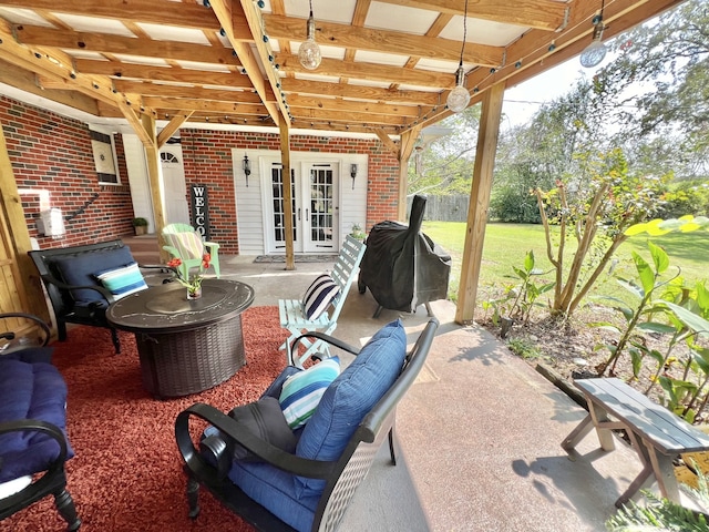 view of patio / terrace featuring a grill and french doors