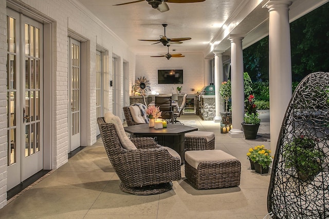 view of patio / terrace with ceiling fan and french doors