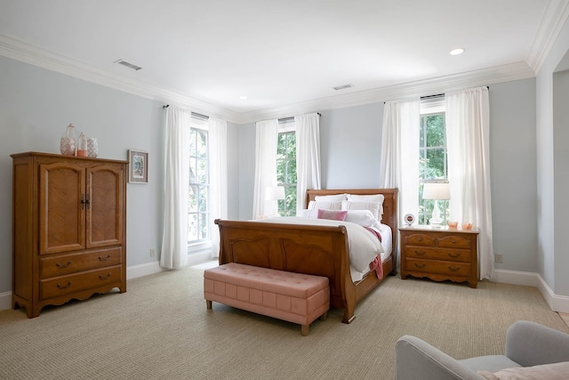 carpeted bedroom with ornamental molding and multiple windows