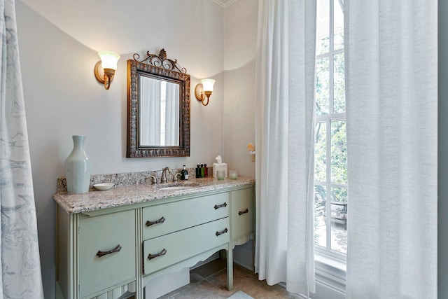 bathroom with vanity and tile patterned floors