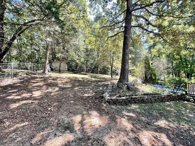 view of yard with a shed