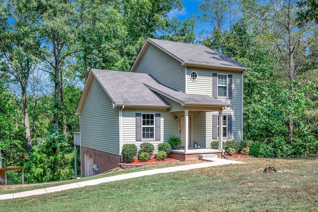 view of front of home featuring a front yard