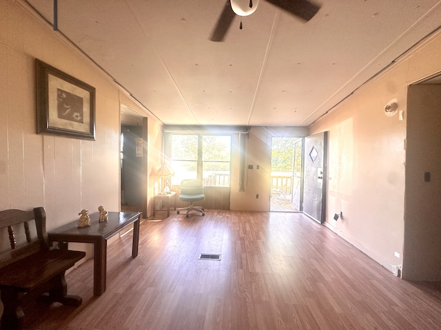 interior space featuring ceiling fan and hardwood / wood-style flooring