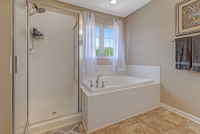 bathroom featuring plus walk in shower