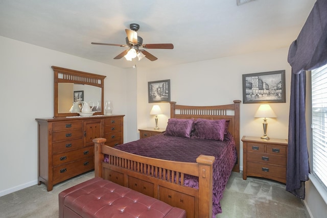 bedroom featuring ceiling fan and carpet floors