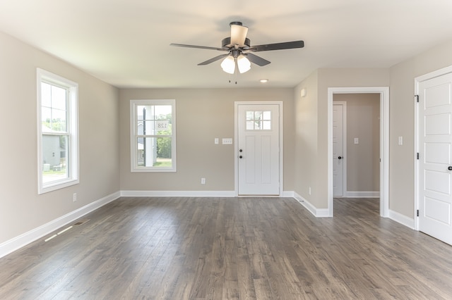 entrance foyer featuring ceiling fan and dark hardwood / wood-style floors