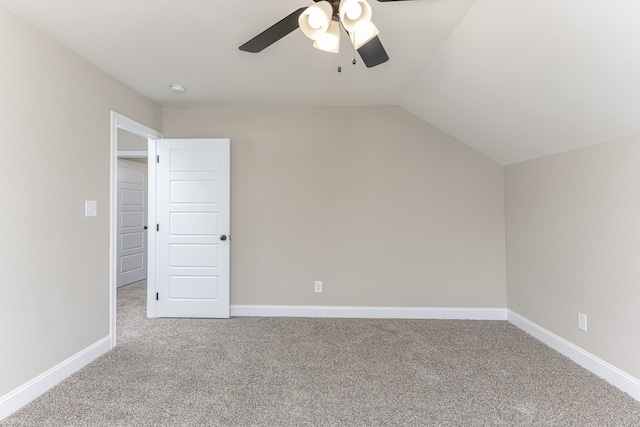 bonus room with lofted ceiling, ceiling fan, and carpet flooring