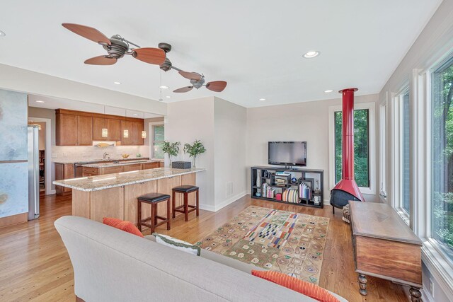 5053 Villa Crest Dr, Nashville, TN 37220 - living room featuring light wood-style floors, a ceiling fan, and recessed lighting