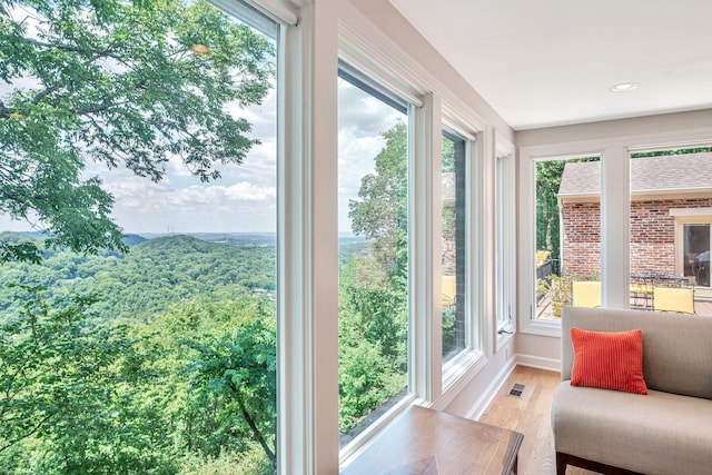 5053 Villa Crest Dr, Nashville, TN 37220 - sunroom / solarium with wood finished floors, plenty of natural light, and recessed lighting