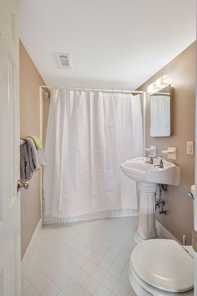5053 Villa Crest Dr, Nashville, TN 37220 - full bathroom with tile patterned floors and a shower with shower curtain