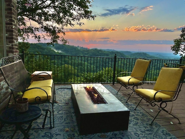 5053 Villa Crest Dr, Nashville, TN 37220 - patio terrace at dusk featuring a fire pit