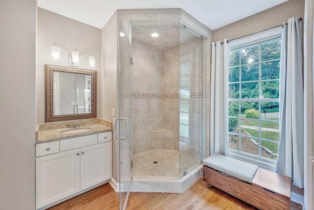 5053 Villa Crest Dr, Nashville, TN 37220 - bathroom with wood finished floors, a stall shower, and vanity