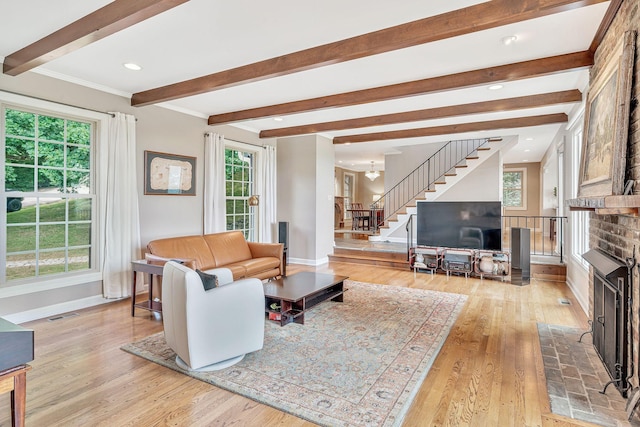 5053 Villa Crest Dr, Nashville, TN 37220 - living area featuring stairs, light wood-style flooring, beam ceiling, a fireplace, and a chandelier