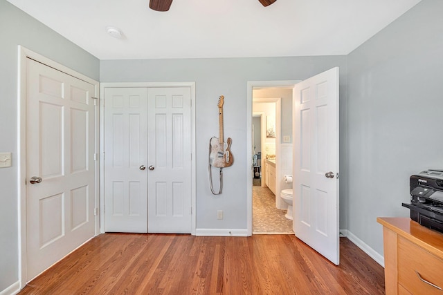 5053 Villa Crest Dr, Nashville, TN 37220 - bedroom featuring wood finished floors, a closet, and a ceiling fan