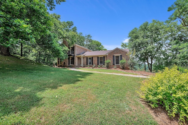 5053 Villa Crest Dr, Nashville, TN 37220 - view of front of home featuring brick siding and a front yard