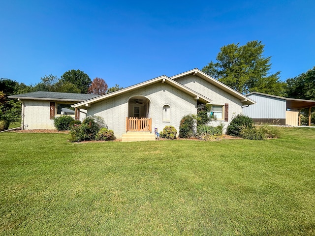 ranch-style house with a front lawn and a carport